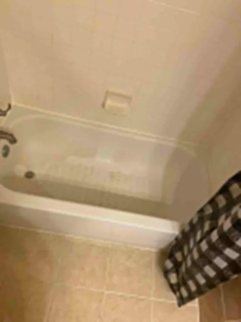 Soaking tub wiped down with faucet polished