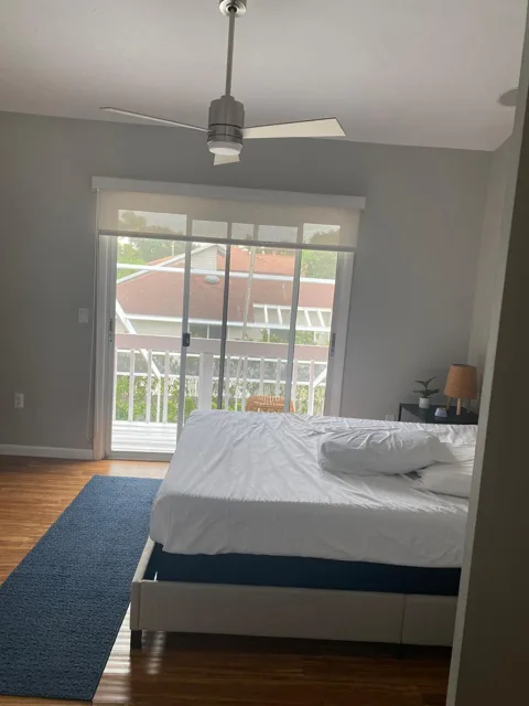 Simple bedroom refreshed with clean white bedding