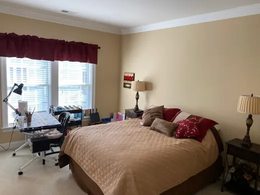 Bedroom with desk area cleaned and organized