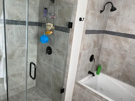 Glass shower enclosure cleaned streak free