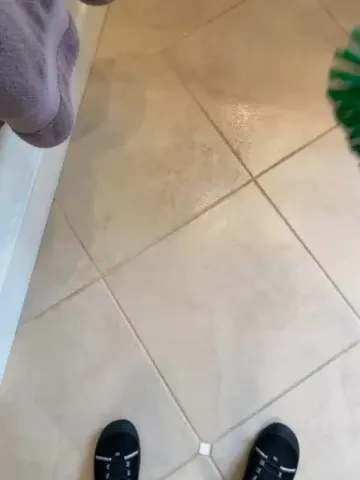 Floor being scrubbed during a cleaning visit