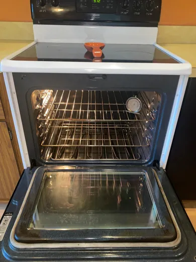 Glass-top stove and oven cleaned to a shine