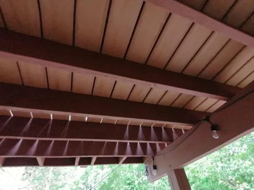 Covered patio ceiling cleaned of dust and webs